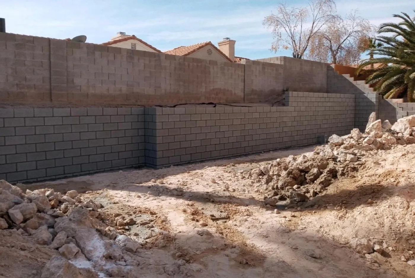 Block privacy wall around a valley backyard