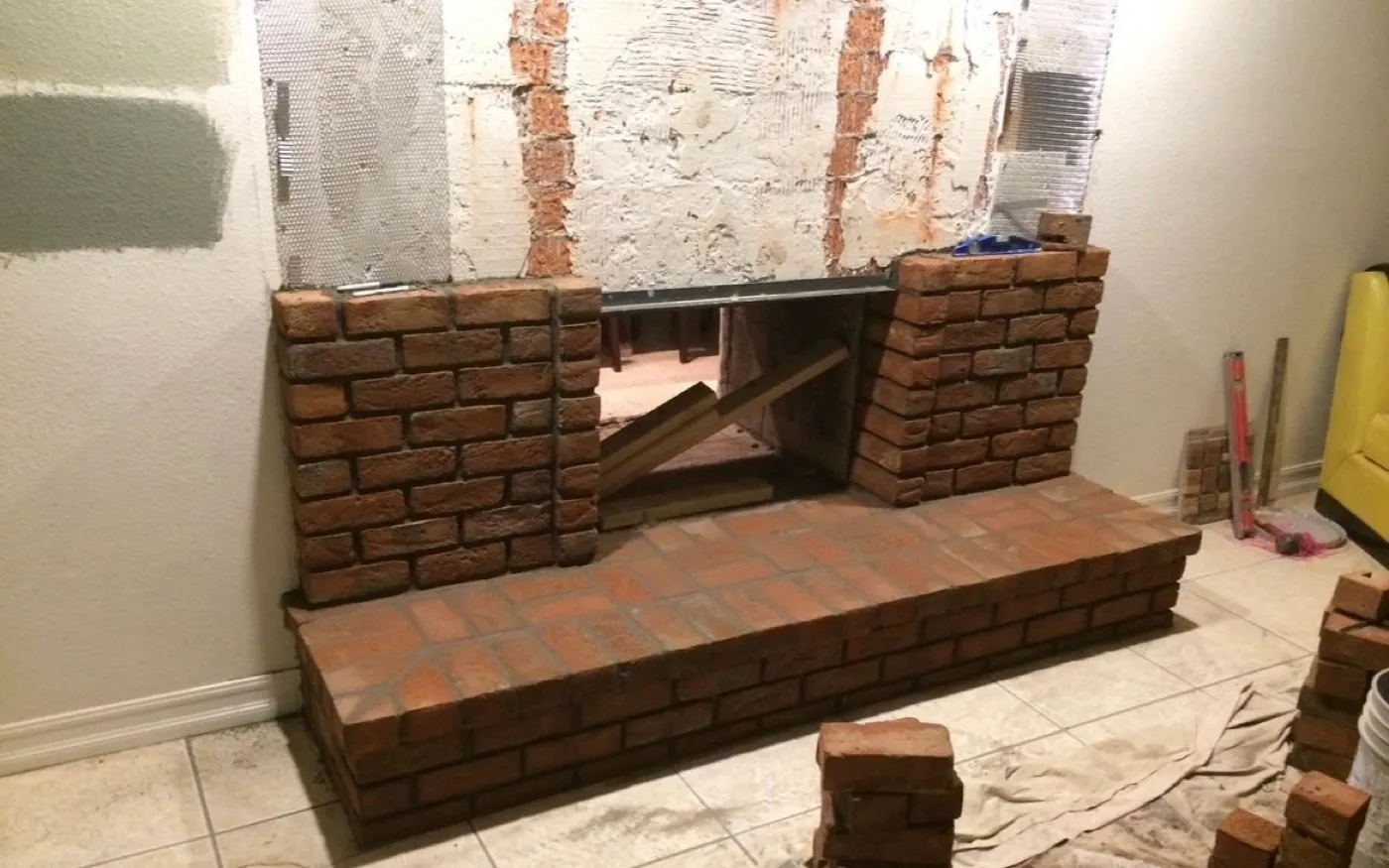 Brick fireplace remodel in progress