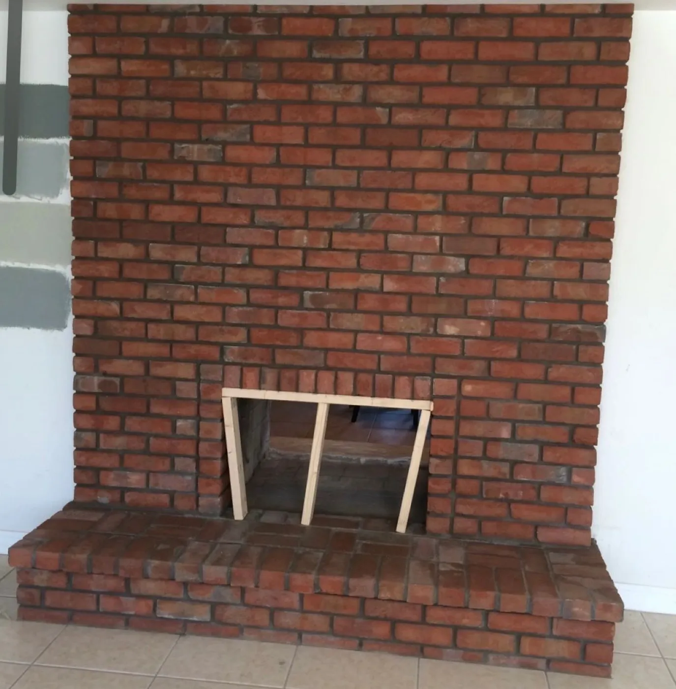 Red brick fireplace built in a Las Vegas home