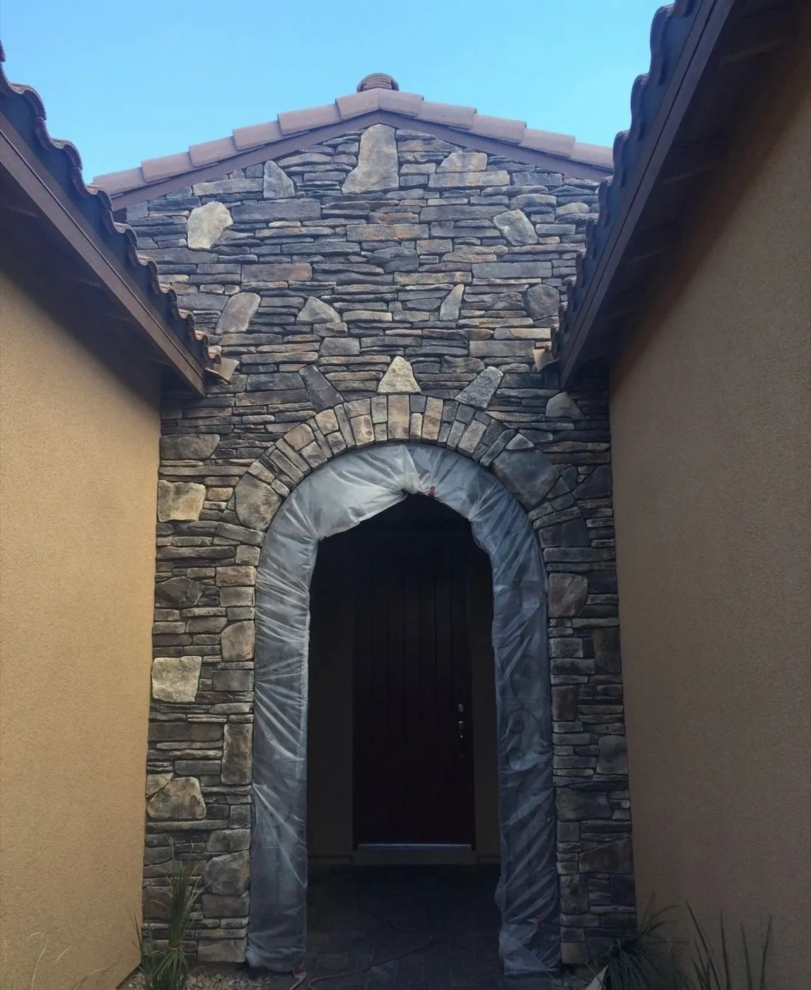 Stone archway entry set by hand